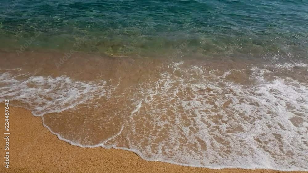 Wave of the sea on the sandy beach Wave of the sea on the sandy beach