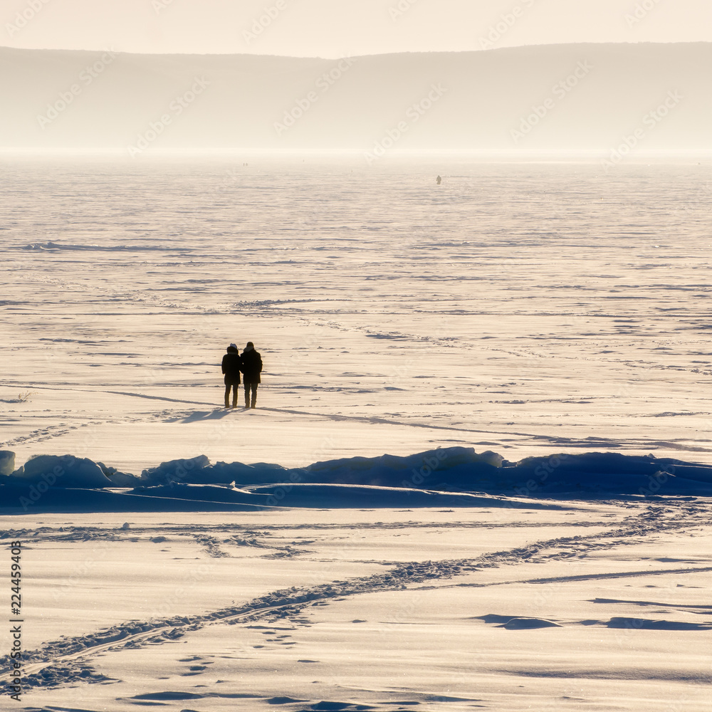 Features winter fishing.Cold winter evening on the river. Features winter fishing.Cold winter evening on the river.