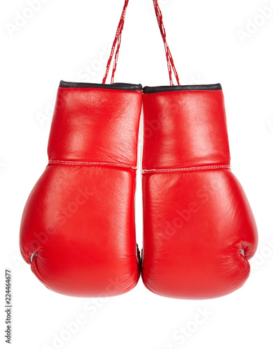 Red professional boxing gloves isolated on white background.