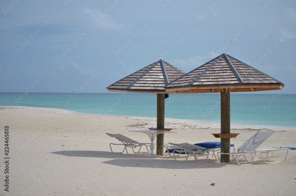 Fototapeta premium beach with chairs and umbrellas