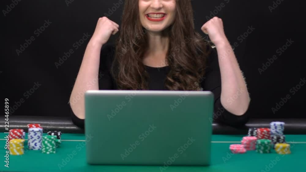 Lucky female rejoicing at winning in online casino, dollars falling from sky Lucky female rejoicing at winning in online casino, dollars falling from sky