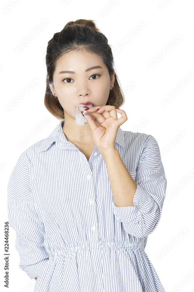 Chinese woman wearing dress and smoking cigarette isolated white background Chinese woman wearing dress and smoking cigarette isolated white background