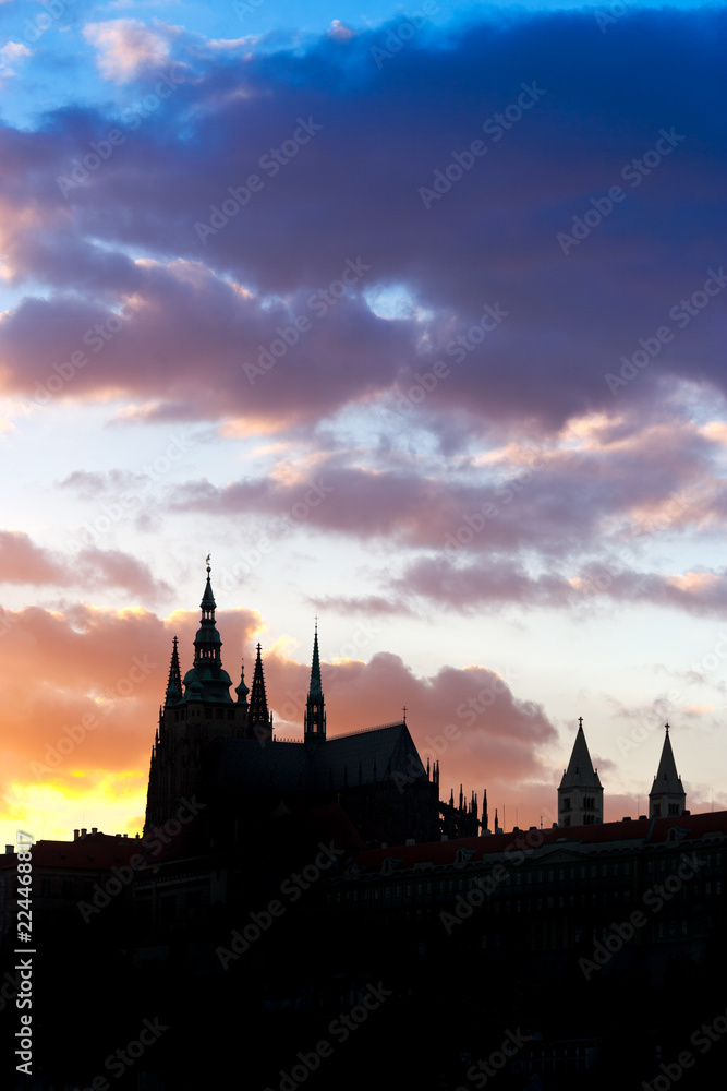  silhouette of St Vitus cathedral on Prague castle, Hradcany, Lesser town district, Prague (UNESCO), Czech republic - dramatic sunset with colorful sky