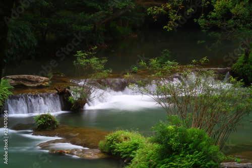 Fototapeta Naklejka Na Ścianę i Meble -  Waterfalls in the lush and beautiful forests of Thailand.