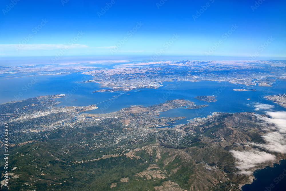     Aerial View of  San Francisco Bay Area: Looking south towards Downtown San Francisco, Sausalito, Belvedere, Bay Bridge with Oakland in the distance. 