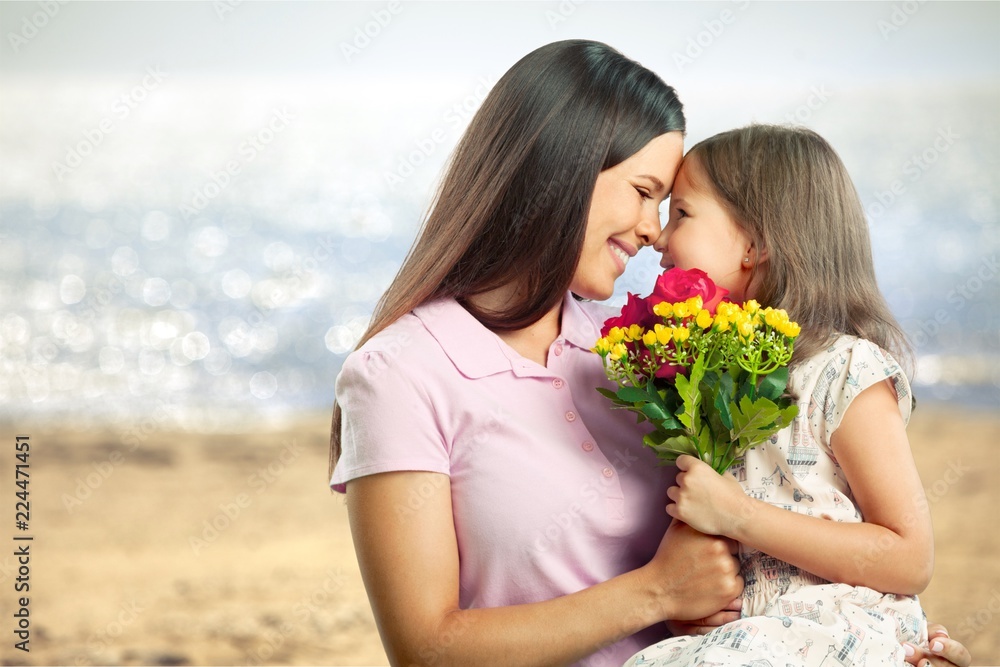Happy Mother and daughter hugging Happy Mother and daughter hugging