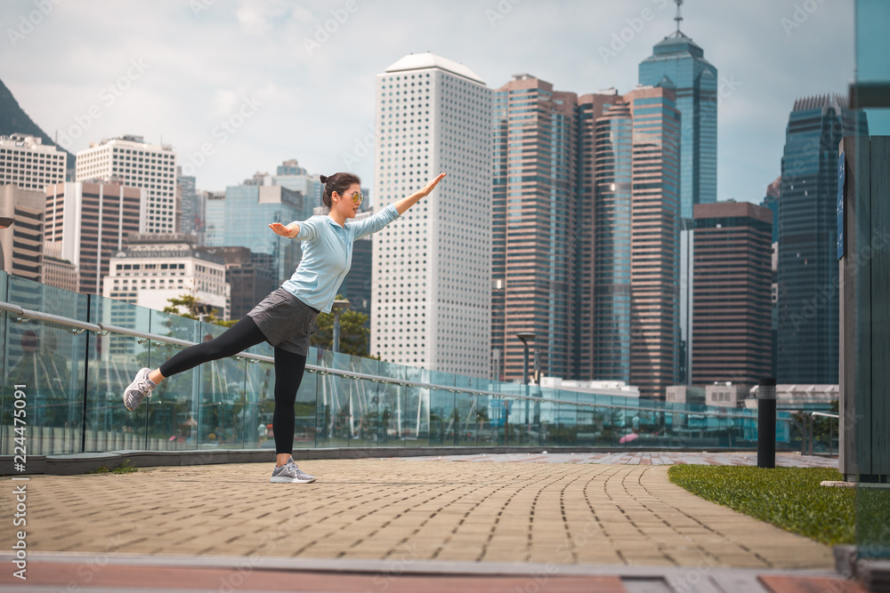 Woman doing workout in Hong Kong Woman doing workout in Hong Kong