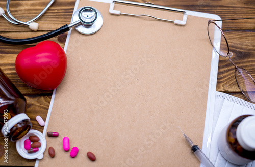 doctor and health concept, physical examination and Heart Disease Checker photo