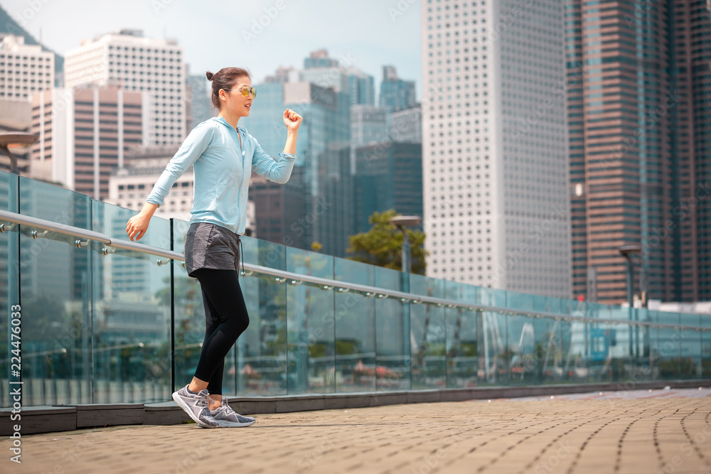 Fitness young woman workout early morning in the city Fitness young woman workout early morning in the city