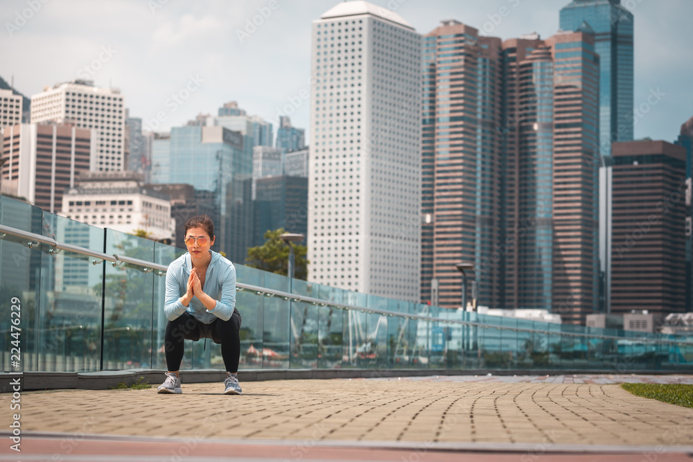 Fitness young woman workout early morning in the city Fitness young woman workout early morning in the city