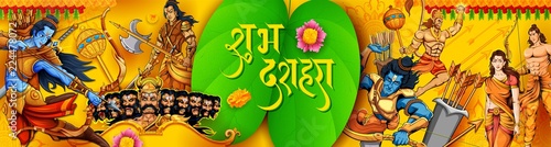 Lord Rama with bow arrow killing Ravan in  Navratri festival of India poster with message in Hindi meaning wishes for Dussehra