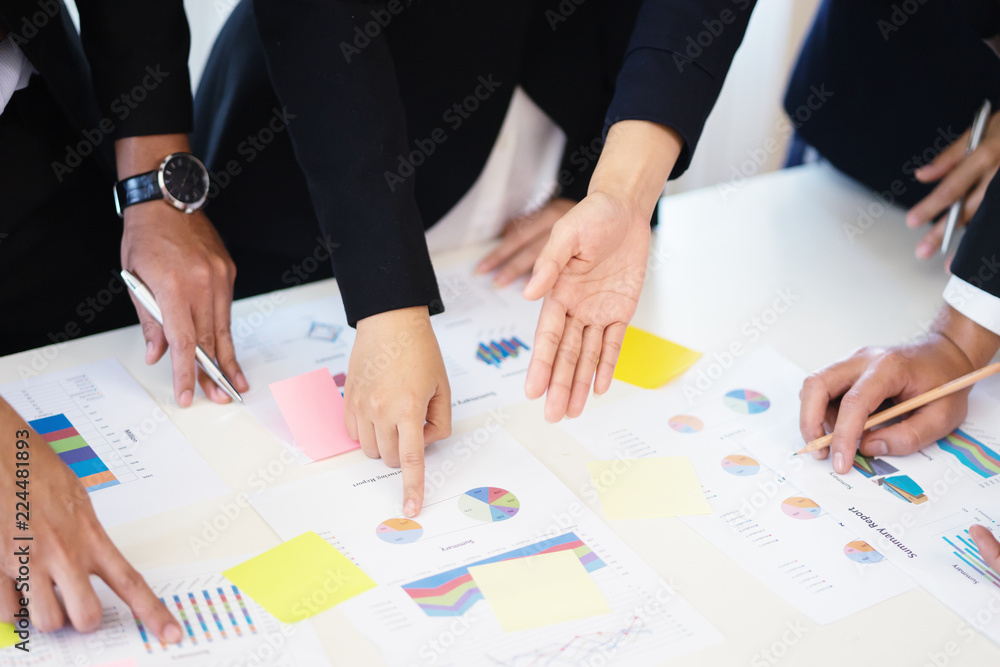 Teamwork concept,man and woman operate in the office with collaborative cooperation or participation,Project managers meet a business crew working with new startup. Analyze business plans