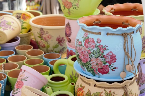 Handmade pots with with paintings of different colours at a marketplace of Troyan, a city of Bulgaria