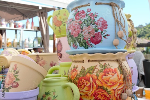 Handmade pots with with paintings of different colours at a marketplace of Troyan, a city of Bulgaria