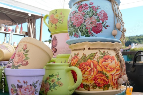 Handmade pots with with paintings of different colours at a marketplace of Troyan, a city of Bulgaria
