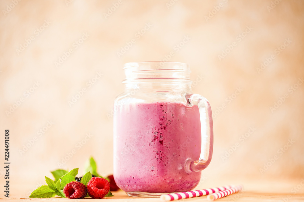 Delicious blackberry raspberry smoothie with mint and fresh berries in glasses. Selective focus. Delicious blackberry raspberry smoothie with mint and fresh berries in glasses. Selective focus.