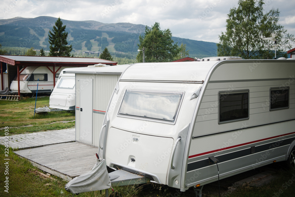 parked trailers near mountains in Trysil, Norway's largest ski resort parked trailers near mountains in Trysil, Norway's largest ski resort
