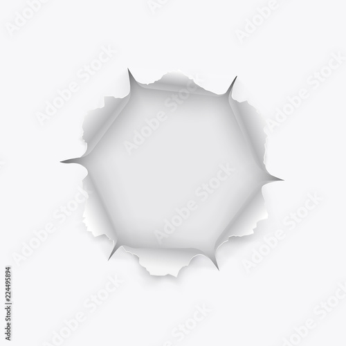 Torn hole in paper with ripped edges with shadow on transparent background. Graphic concept for your design.