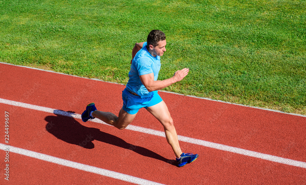 Obraz premium Sport lifestyle and health concept. Man athlete run to achieve great result. How run faster. Speed training guide. List ways to improve running speed. Athlete runner sporty shape in motion