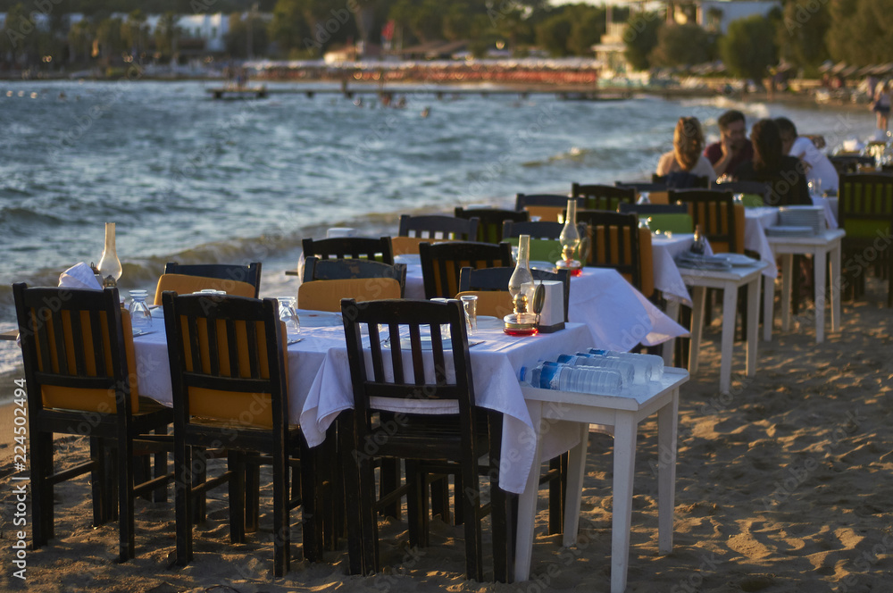 Cafe near the seashore. The coast of the Aegean Sea. Turgusreis, Bodrum, Turkey