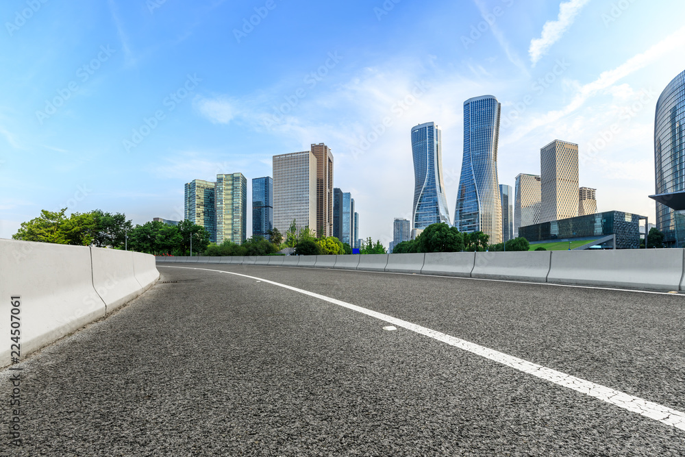 Urban asphalt road and modern buildings in Hangzhou
