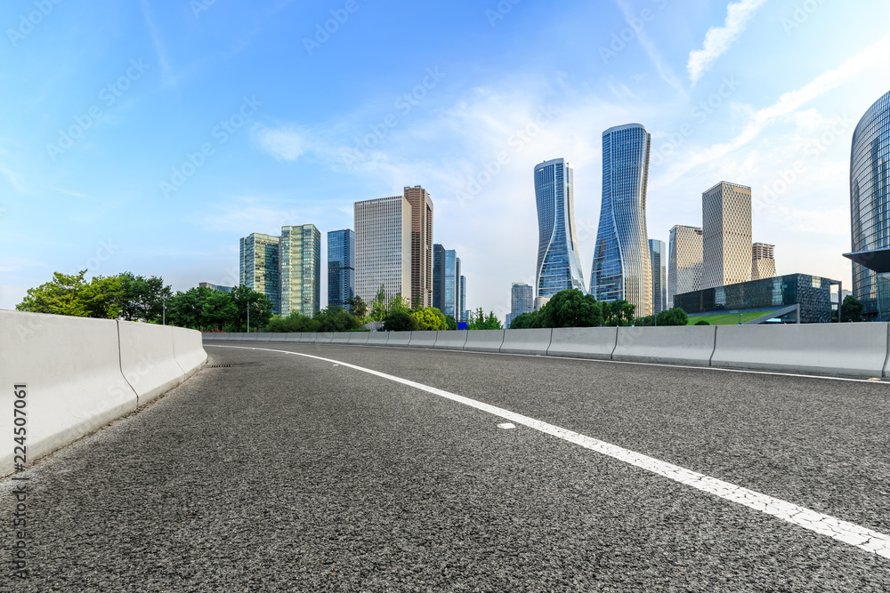 Urban asphalt road and modern buildings in Hangzhou Urban asphalt road and modern buildings in Hangzhou