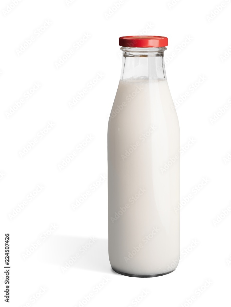 Milk in glass bottle isolated on white Milk in glass bottle isolated on white