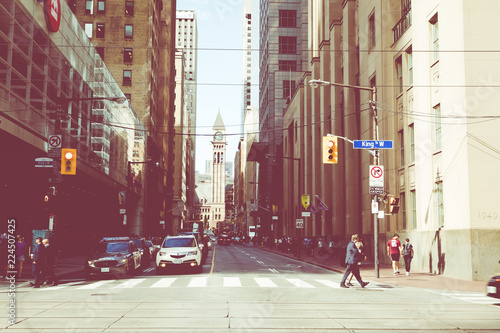 Rush hour atToronto's busiest intersections. Financial district at the background. photo