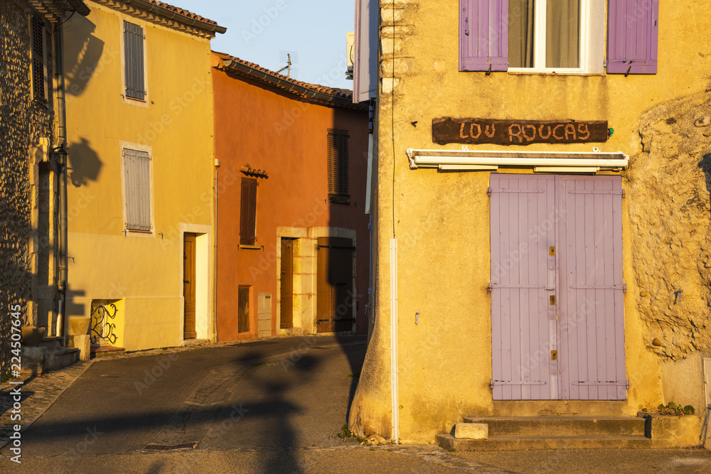 street and colourful houses of the Provence beamed by morning light, village Sainte-Croix-du-Verdon, department Alpes-de-Haute-Provence, region Provence-Alpes-Côte d’Azur