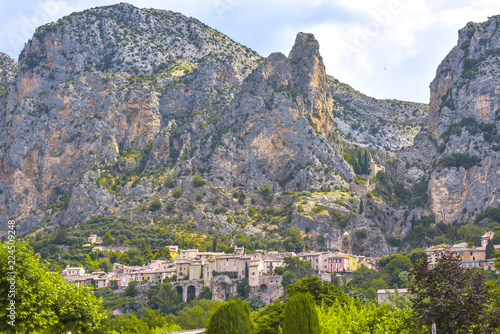 panorama of village Moustiers-Sainte-Marie, Provence, pustside with surrounding mountains and peaks France, member of most beautiful villages of France, department Alpes-de-Haute-Provence