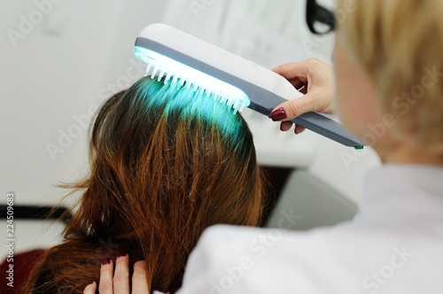 treatment of scalp and hair structure study. Phototherapy, light therapy, ultraviolet, psoriasis, cold sores photo