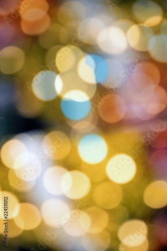 Blurry background image of defocused yellow lights at night © jokerpro