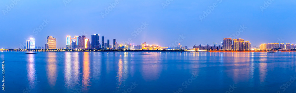 Modern city buildings scenery and rivers in Hangzhou at night