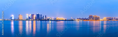 Modern city buildings scenery and rivers in Hangzhou at night © ABCDstock