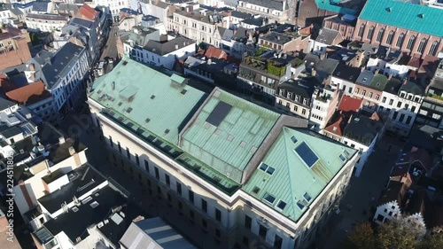 Aerial moving towards Bourla Theatre also known as Bourlaschouwburg located in Antwerp Belgium the building is designed in neoclassical style on site of former Tapissierspand tapestry market 4k photo