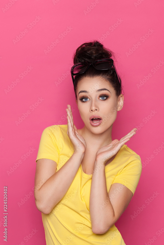 Surprised Beautiful Young Woman Is Holding Head In Hands Surprised Beautiful Young Woman Is Holding Head In Hands