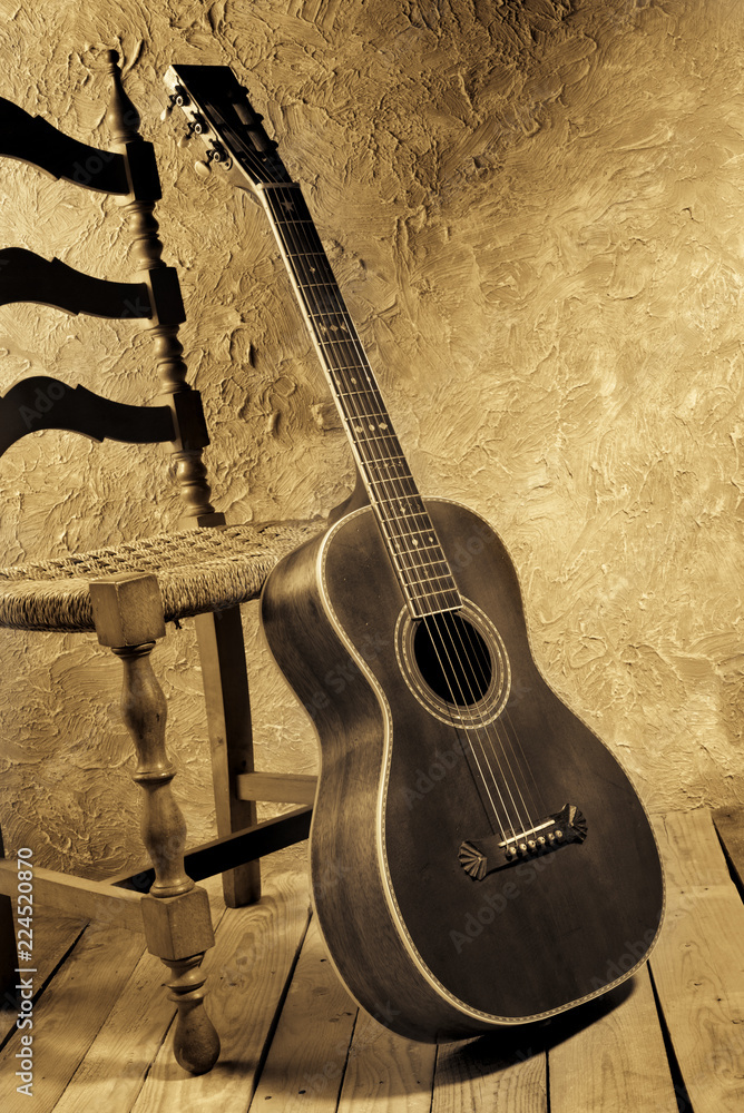 vintage blues guitar with old chair Stock Photo | Adobe Stock