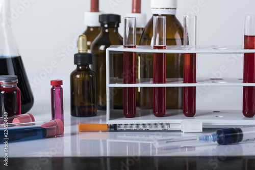 test tubes and laboratory tests with colored liquids