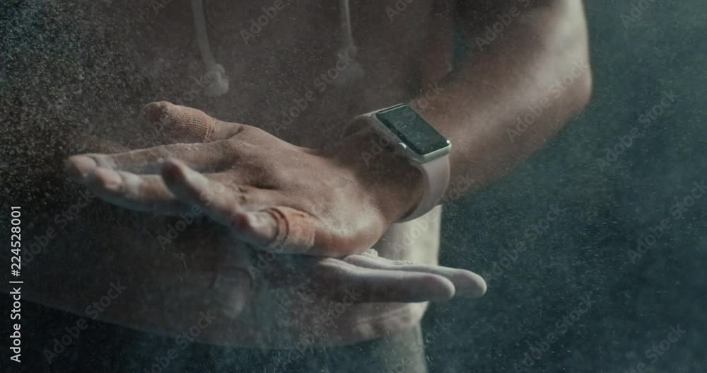 fitness woman athlete hands clapping chalk powder sportswoman preparing training workout in gym ready for bodybuilding strength exercise slow motion close up