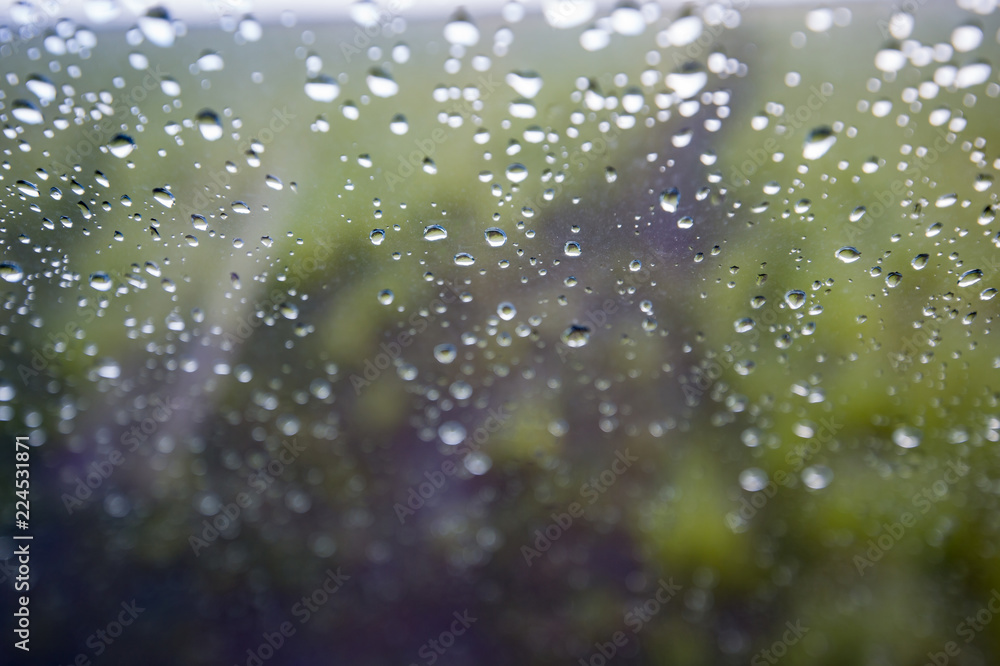 water drops on car window water drops on car window