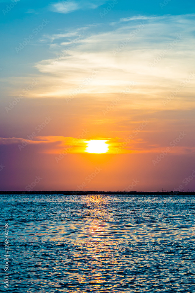 Colorful twilight sky in the sea.  wide seascape serene feeling. image for background, wallpaper, zen inspire, yoga inspire and copy space.