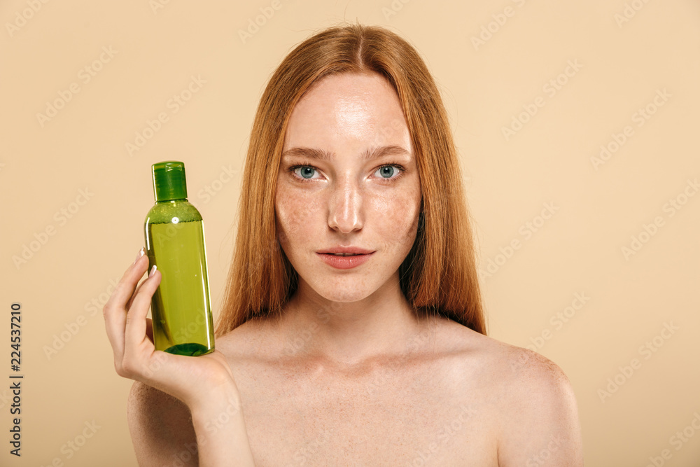 Beauty portrait of a healthy young topless redhead girl Beauty portrait of a healthy young topless redhead girl