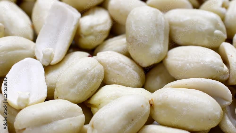 Peeled dry peanuts in a dolly shot, sliding camera move, 4K resolution Peeled dry peanuts in a dolly shot, sliding camera move, 4K resolution