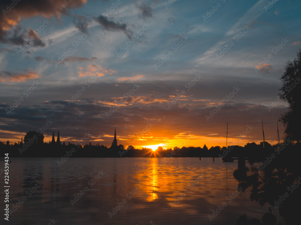 Naklejka premium Sundown over Lübeck, Germany