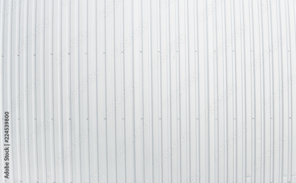 Metal white sheet for industrial building and construction. Roof sheet metal or corrugated roofs of factory building or warehouse. Metal white sheet for industrial building and construction. Roof sheet metal or corrugated roofs of factory building or warehouse.