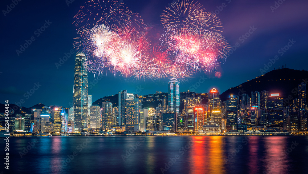 Naklejka premium Firework show in Hong Kong Victoria Harbor