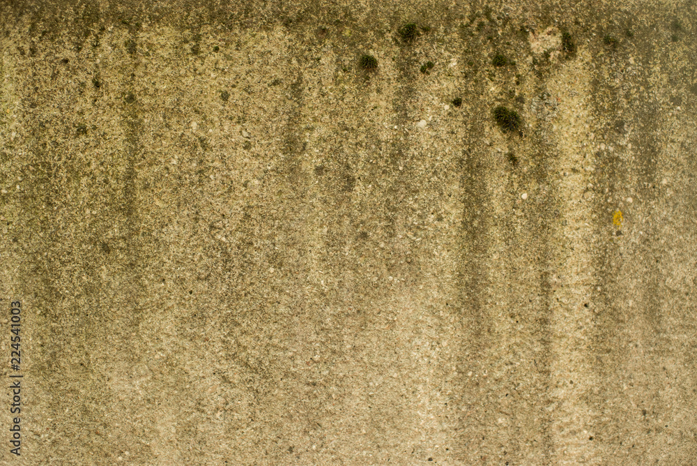 The beige colored wall with the cracked stucco texture background. The beige colored wall with the cracked stucco texture background.