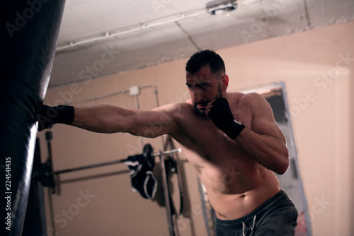 Boxer striking the punching bag