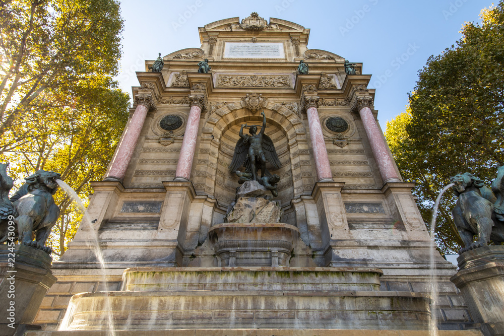 Obraz premium Fontaine Saint-Michel , monumental fountain at Place Saint-Michel in the 5th arrondissement in Paris. It was constructed in 1858Ð1860 during the French Second Empire by the architect Gabriel Davioud.