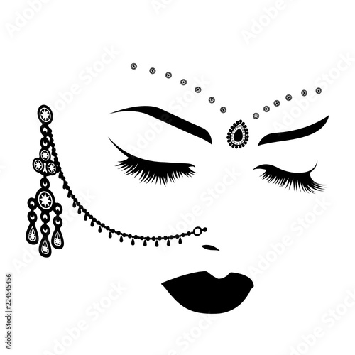

Illustration depicting a woman's face with Indian ornaments